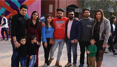 A batch of alumni posing together for a photo