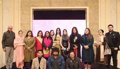 A batch of alumni posing together for a photo
