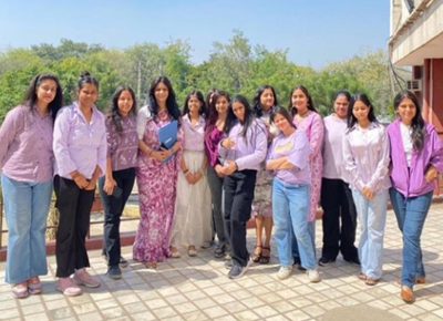 students celebrating women achievements